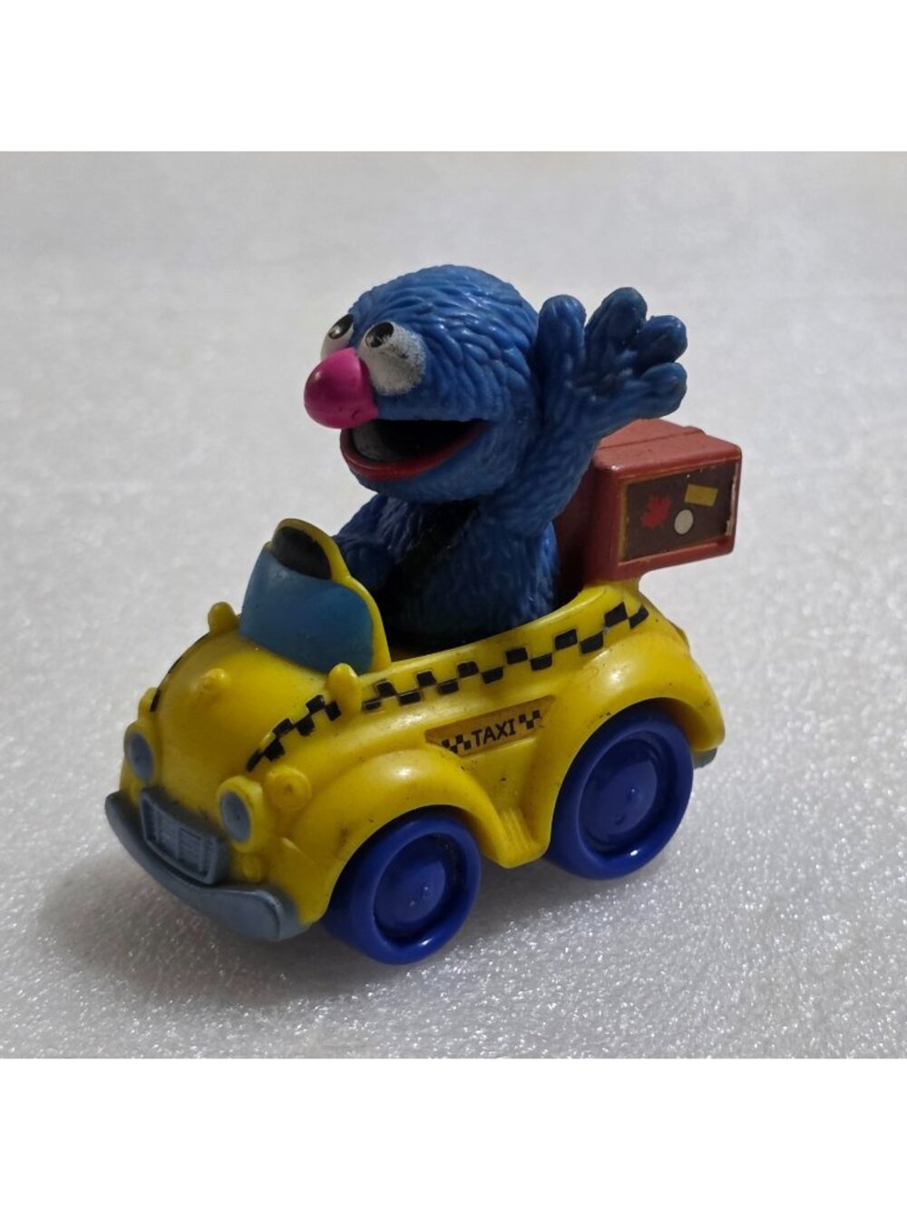 Sesame Street Grover Taxi Diecast Plastic Vehicle Suitcase 2013 Hasbro Toy 3"